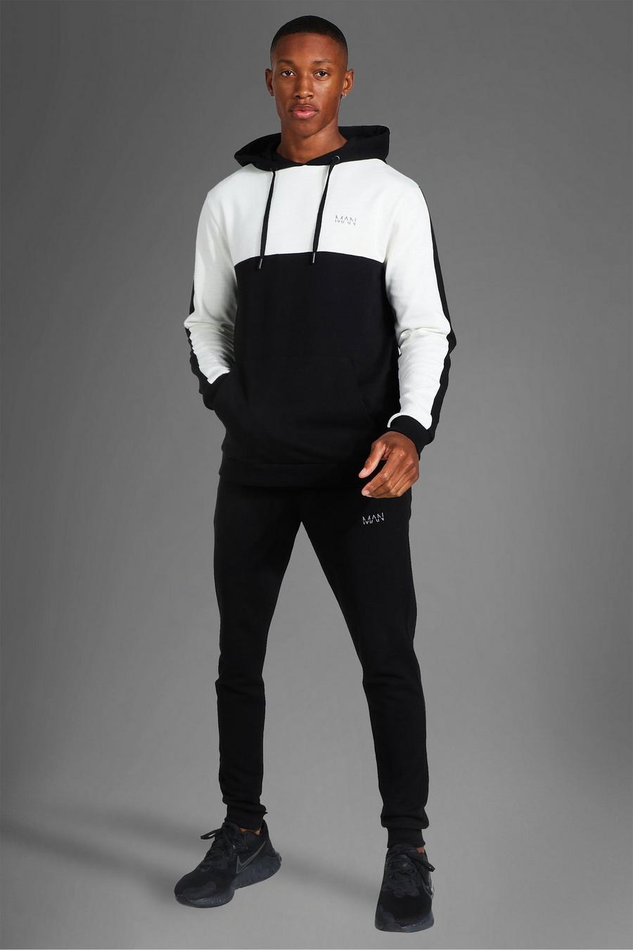 Black svart MAN Active Träningsoverall med hoodie och blockfärger image number 1