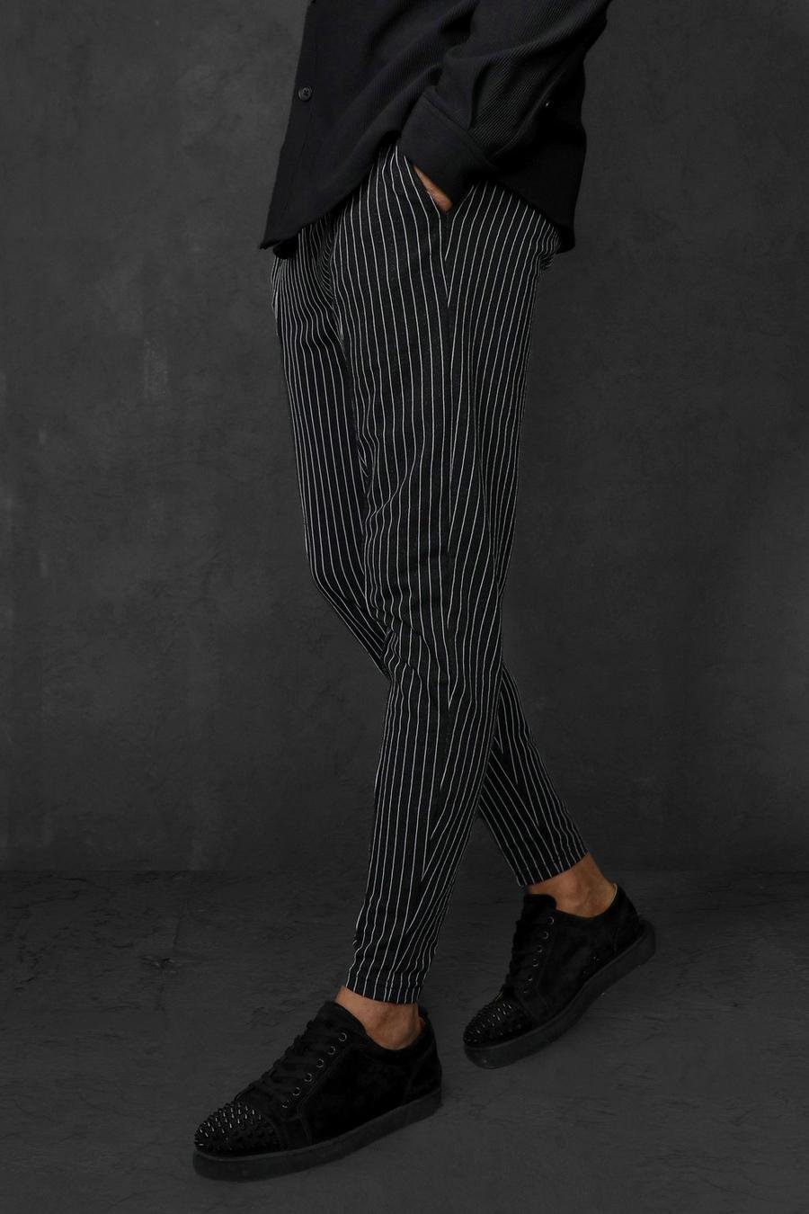 Pantaloni tuta affusolati in jacquard a righe verticali, Black nero image number 1