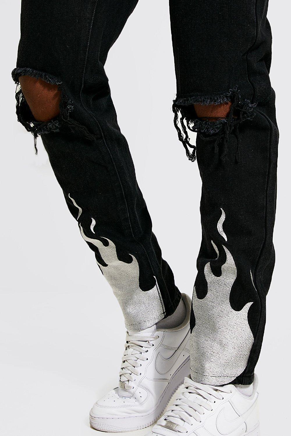 black jeans with white flames