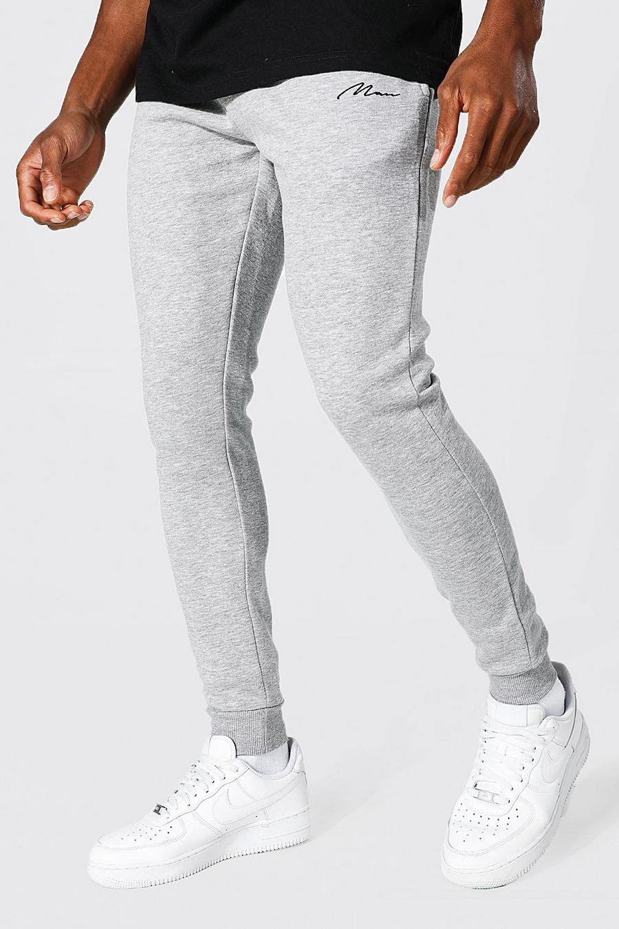 Pantalones deportivos súper pitillo reciclados con firma MAN, Grey grigio image number 1