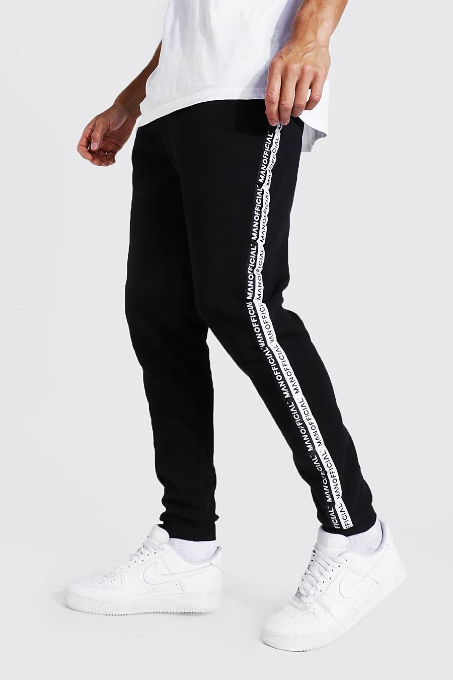 Pantaloni tuta Tall Skinny Fit con striscia laterale con logo Man Official, Black negro image number 1