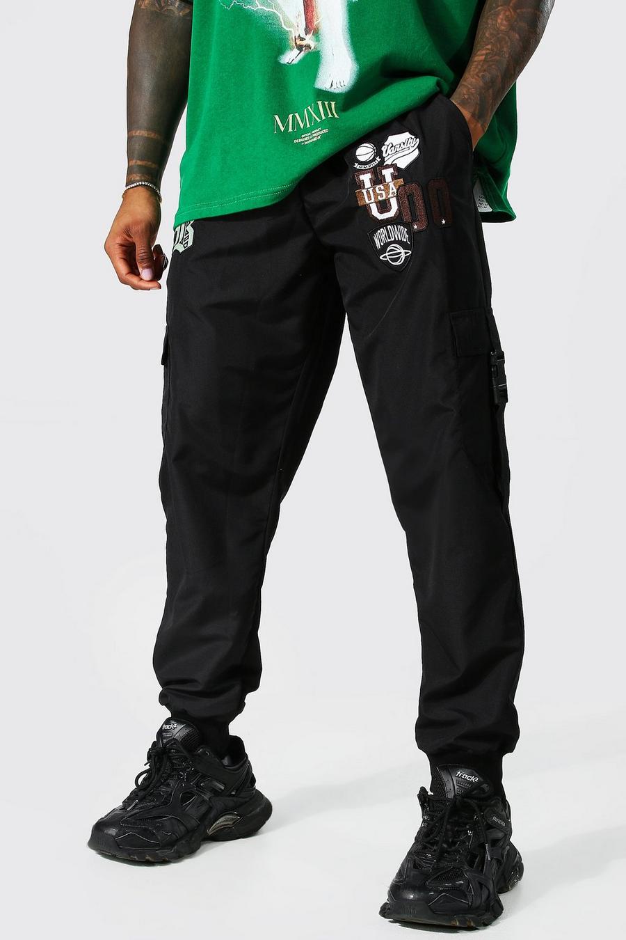 Pantaloni Cargo Man stile Varsity in tessuto Shell, Black nero image number 1