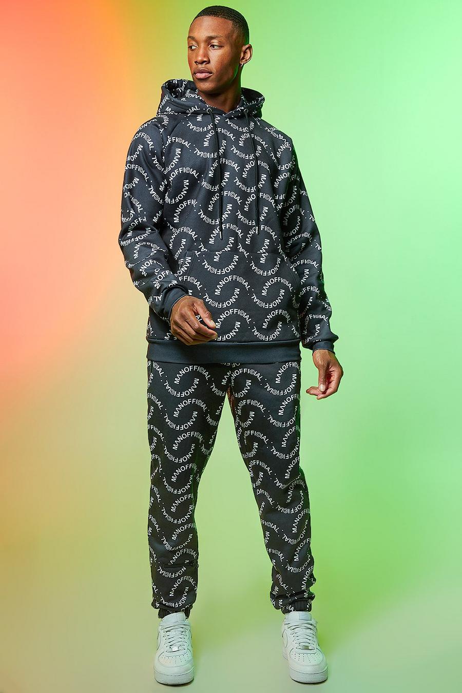 Black MAN Ofcl Mönstrad träningsoverall med hoodie image number 1