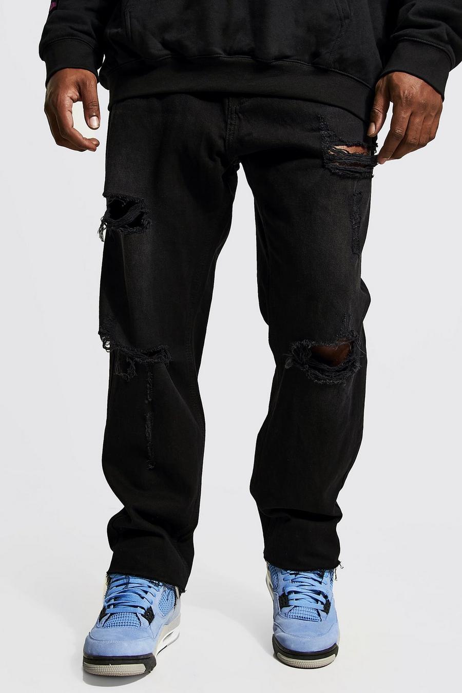 שחור דהוי ג'ינס ripped בגזרה צרה עם קרעים במכפלת, מידות גדולות