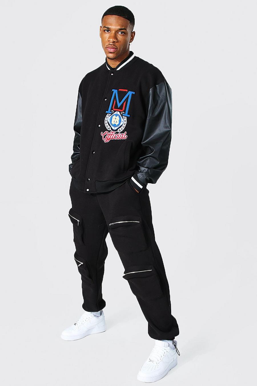 שחור חליפת טרנינג בומבר אוברסייז בסגנון נבחרת ספורט עם כיתוב Official image number 1