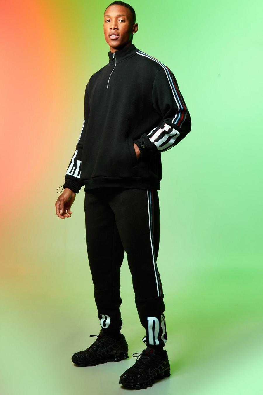 שחור חליפת טרנינג עם צווארון משפך וכיתוב Worldwide image number 1