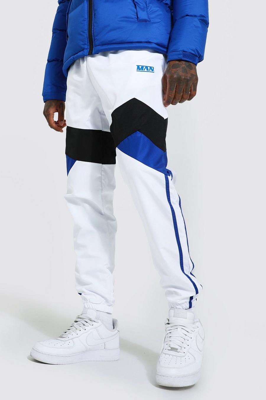 Pantalón deportivo MAN de tela shell con colores en bloque, White blanco image number 1