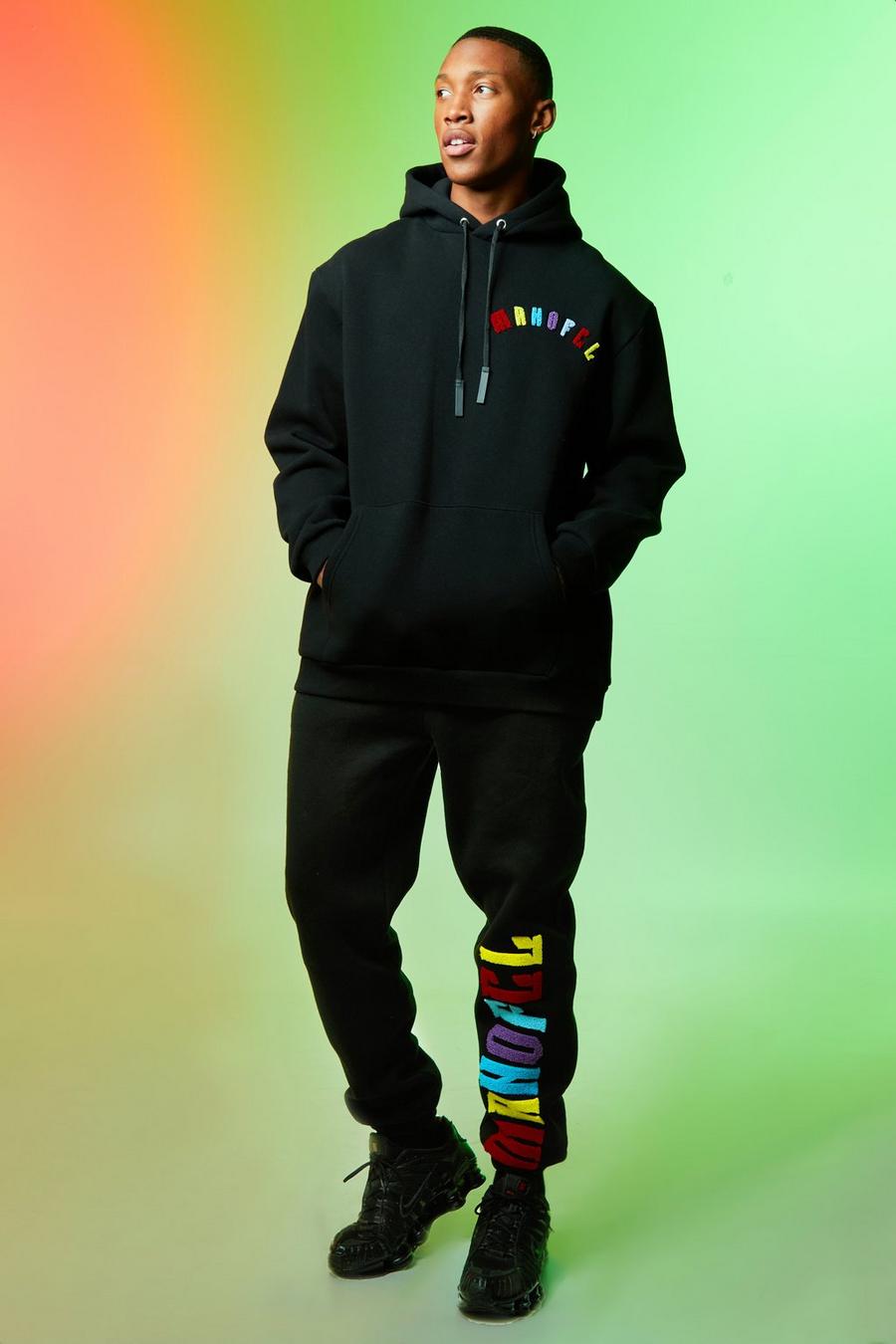 שחור חליפת טרנינג אוברסייז עם אפליקציית Man Ofcl image number 1