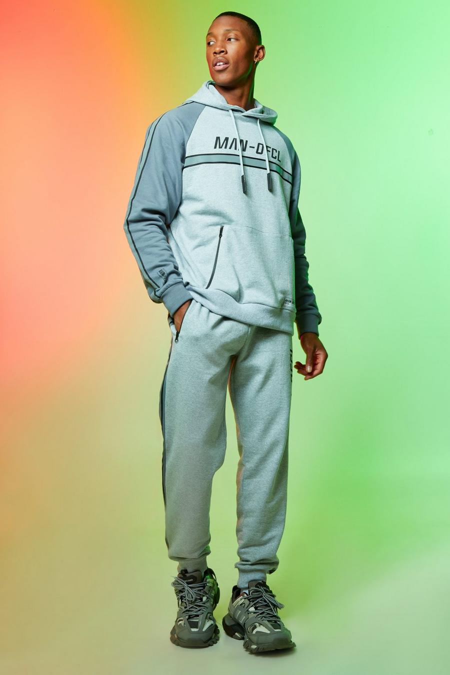 Grey marl MAN Ofcl Träningsoverall med raglanärm, huva och reflexdetaljer image number 1