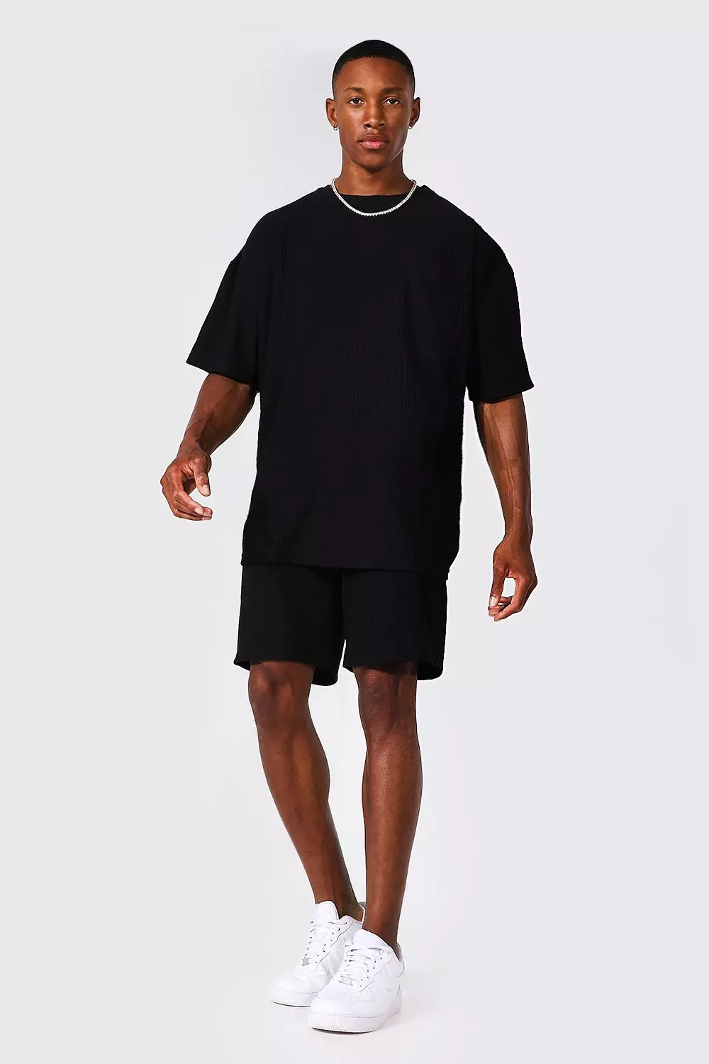 Black shirt deals with shorts