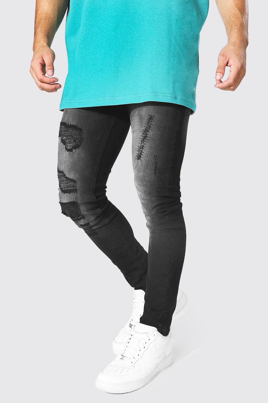 שחור דהוי סופר סקיני ג'ינס עם קרעים וטלאים מרובים image number 1