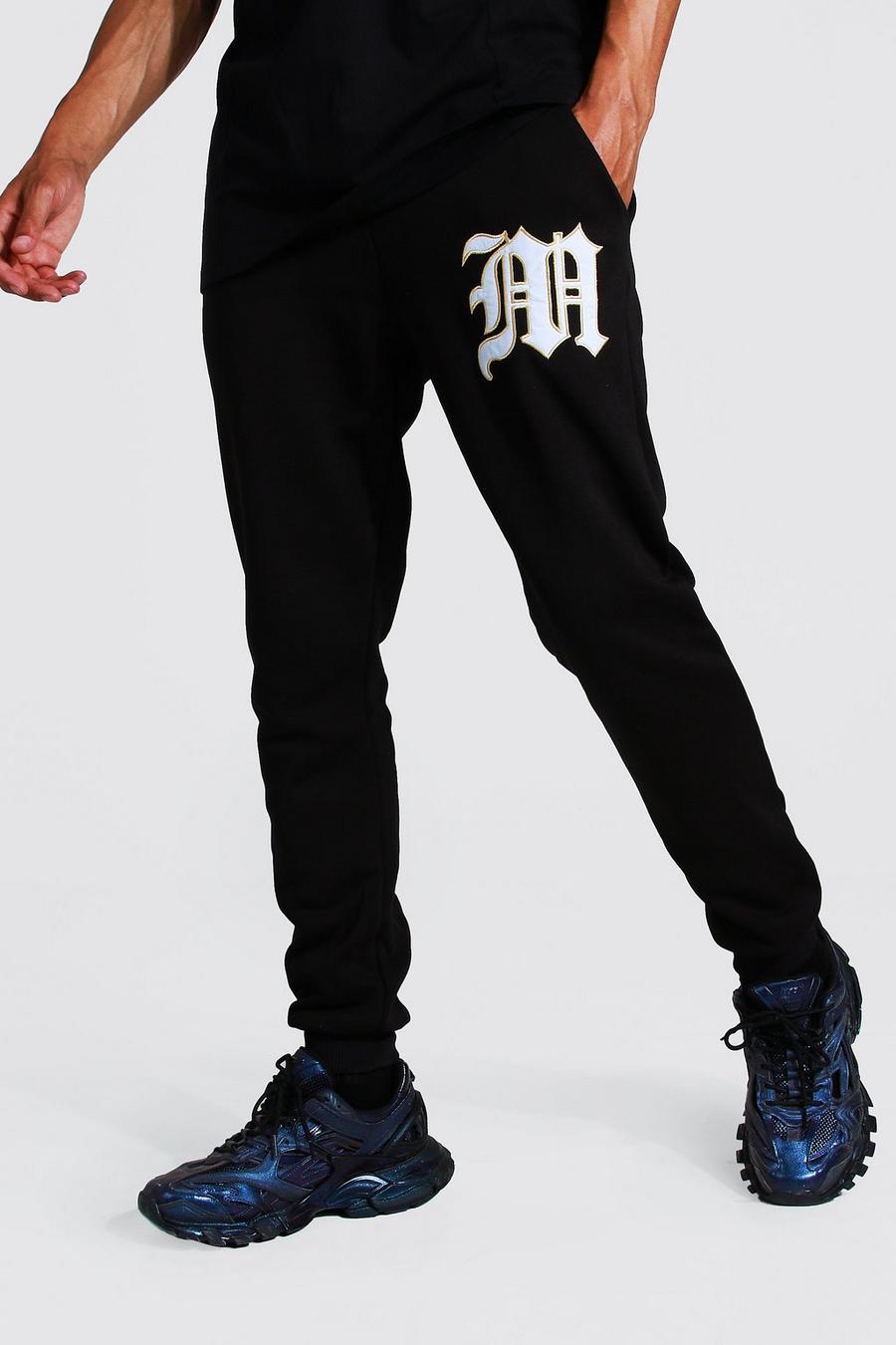 Pantalón deportivo Tall MAN universitario con apliques, Black negro