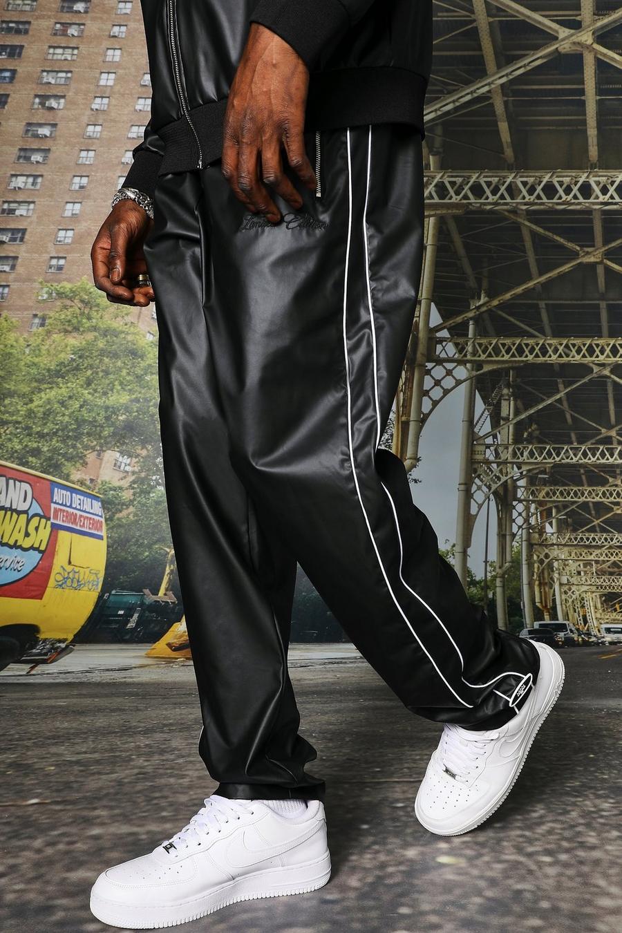 Pantalón deportivo de pernera ancha y cuero sintético, Black nero image number 1