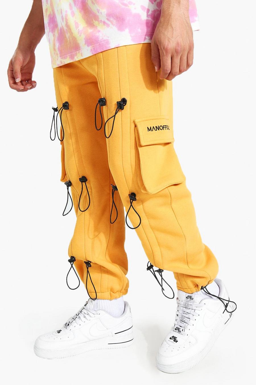 צהוב מכנסי ריצה דגמ"ח בגזרה רגילה עם תפסי רכיסה וכיתוב Official image number 1