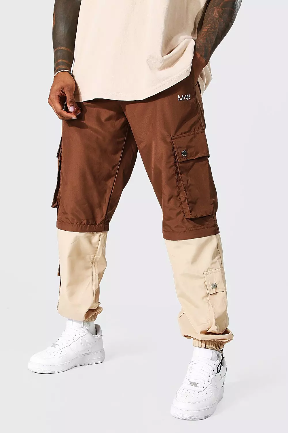 Man Multipocket Zip Off Leg Cargo Trousers