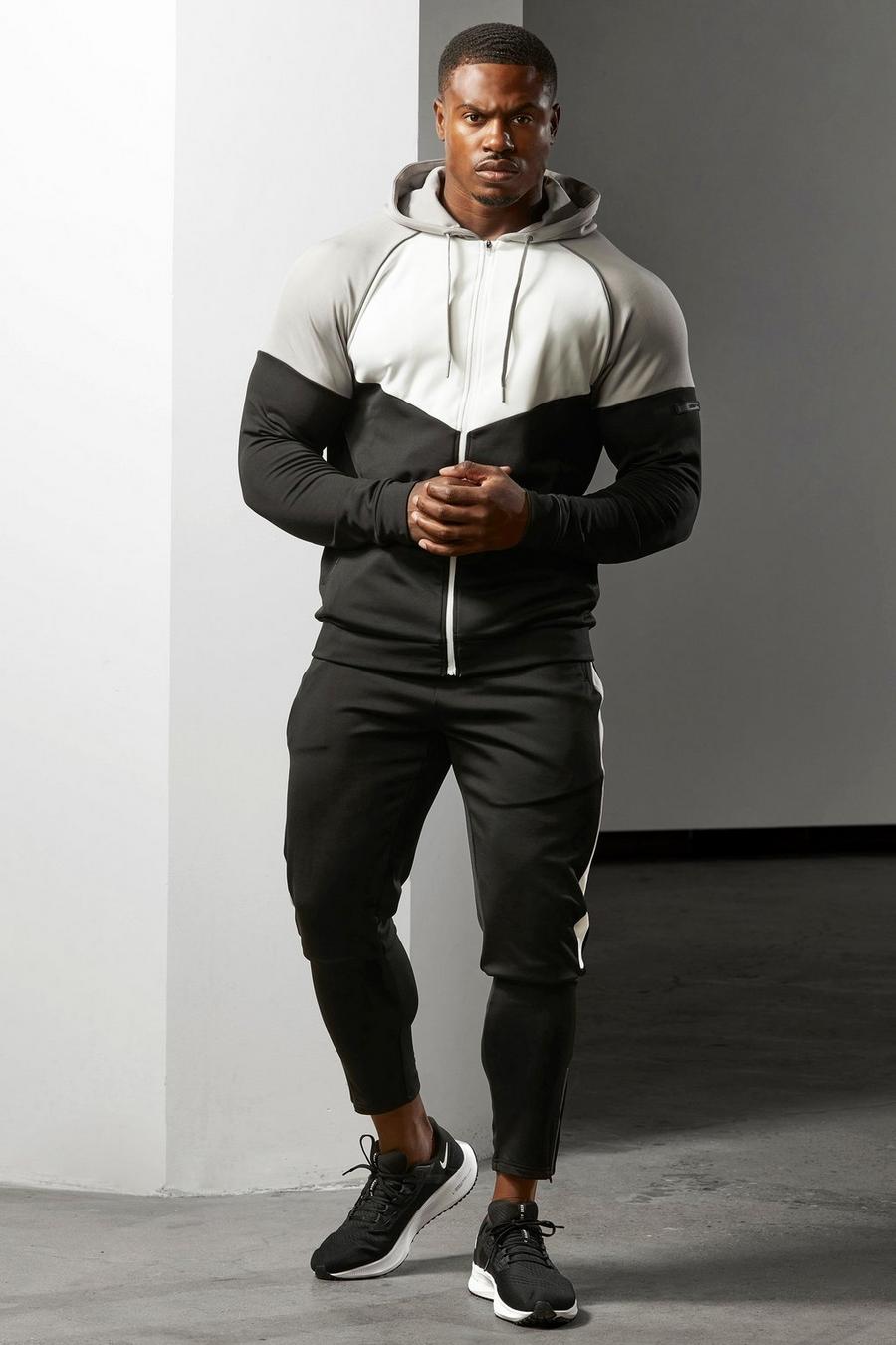 Man Active Colorblock Trainingsanzug mit Reißverschluss, Black image number 1