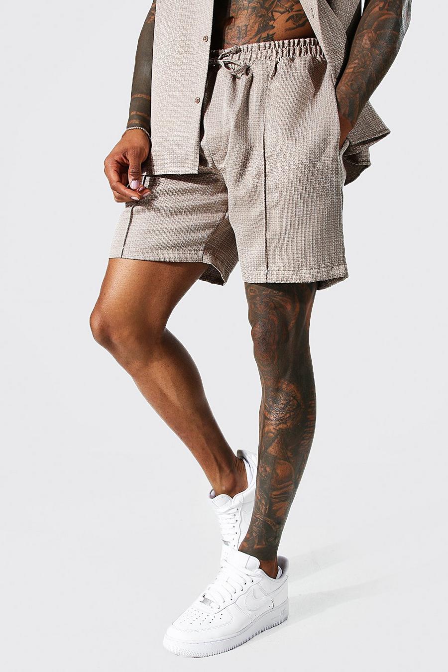 Pantalón corto elástico de lino con corte medio, Brown marrón image number 1