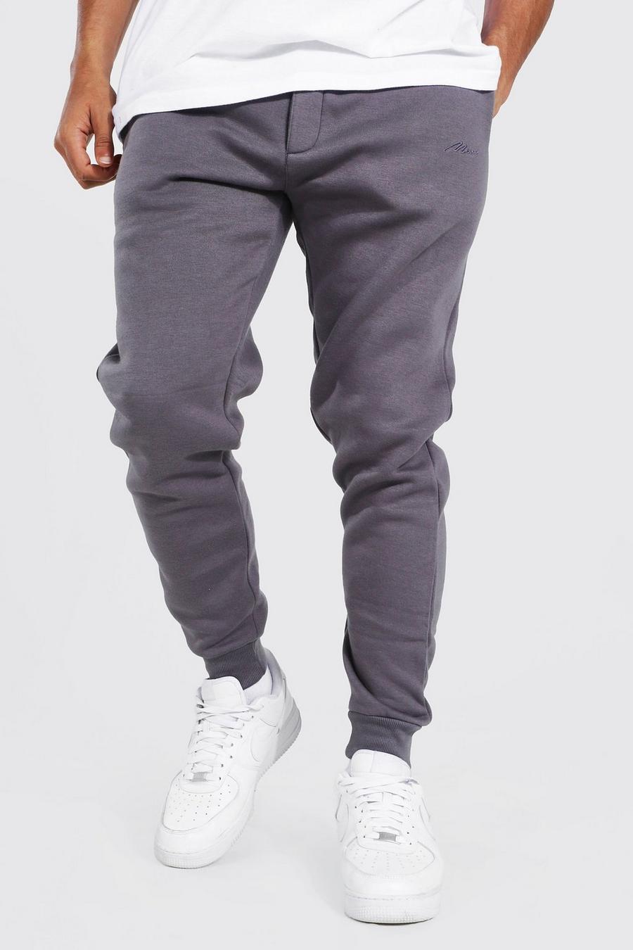 Pantalón deportivo pitillo con firma MAN, Charcoal gris image number 1