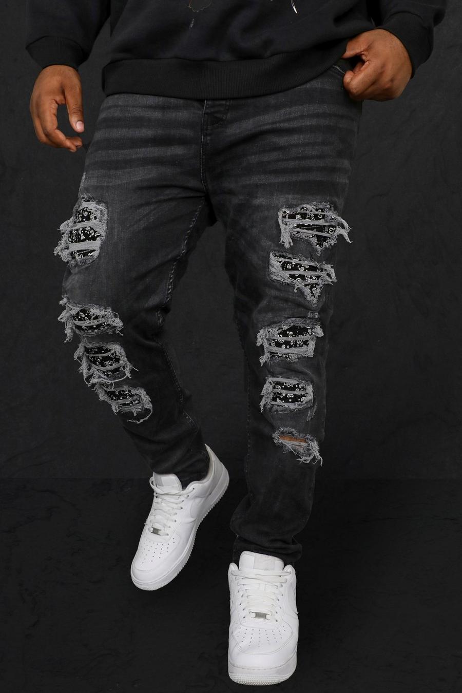 שחור דהוי ג'ינס אופנוענים סקיני עם קרעים וטלאים והדפס חוזר, מידות גדולות image number 1