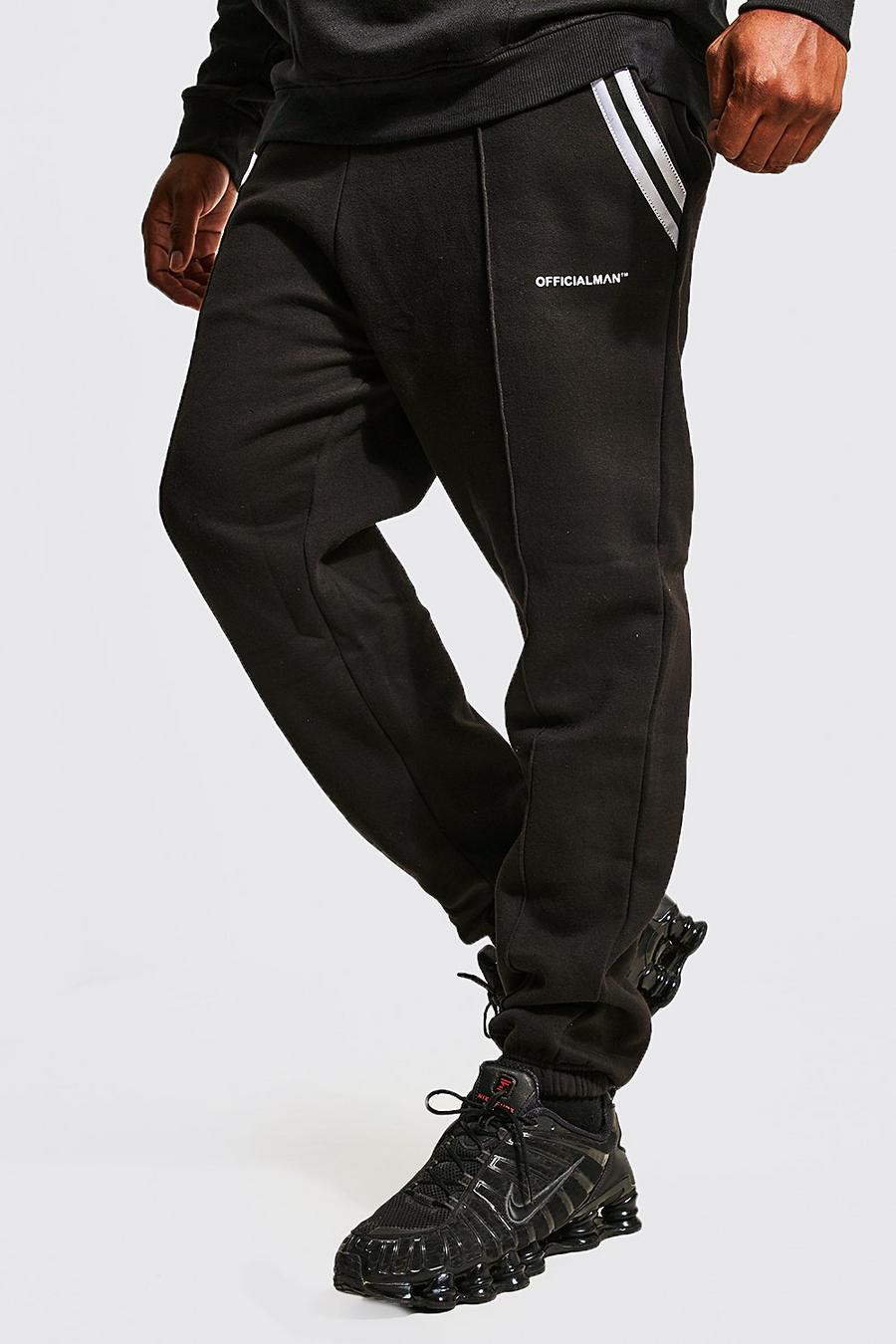 Pantaloni tuta Plus Size Slim Fit con nervature, strisce e tasche, Black negro image number 1