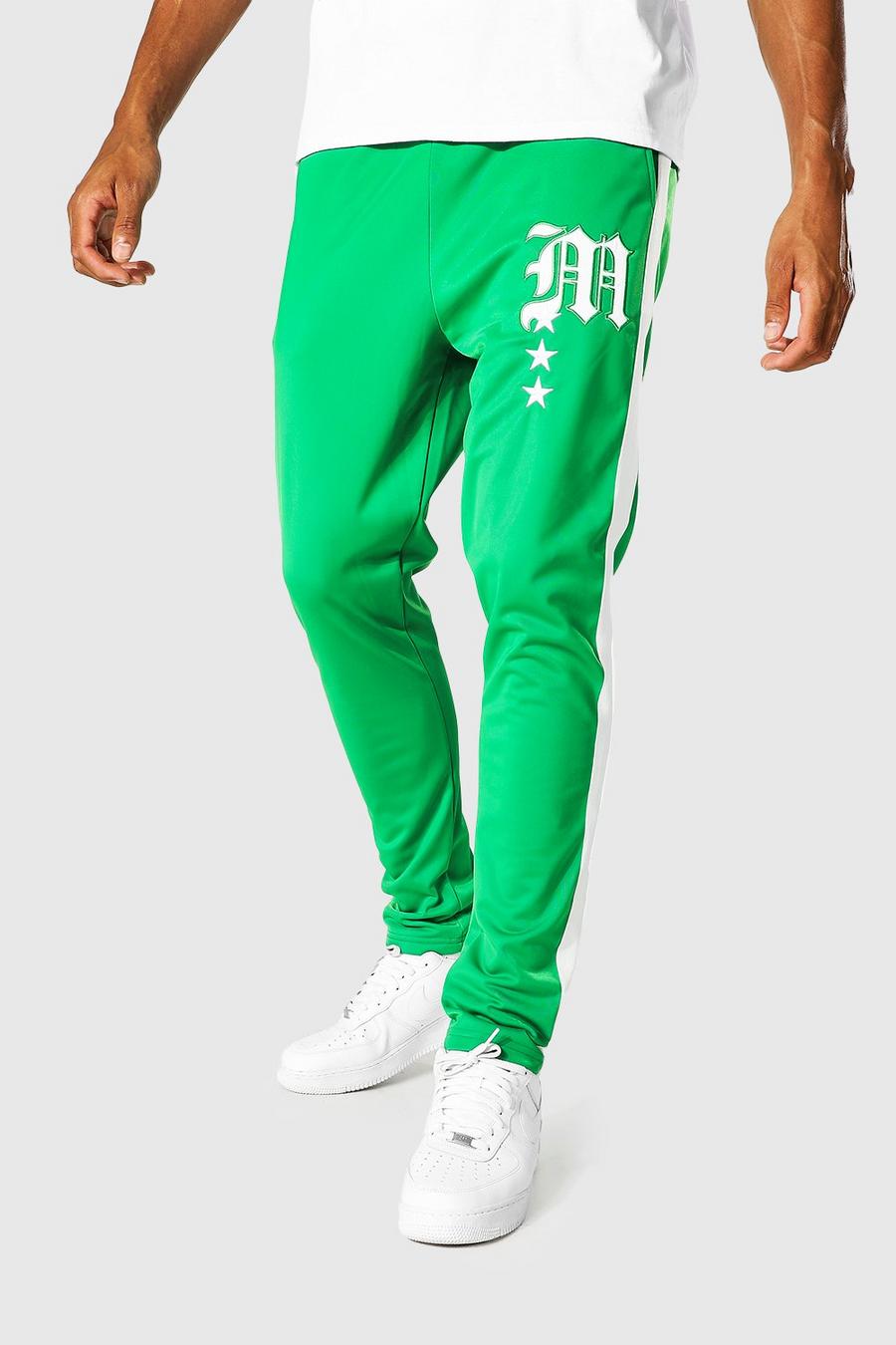 Green grön Tall - Skinny joggers i trikå med varsitydetaljer image number 1