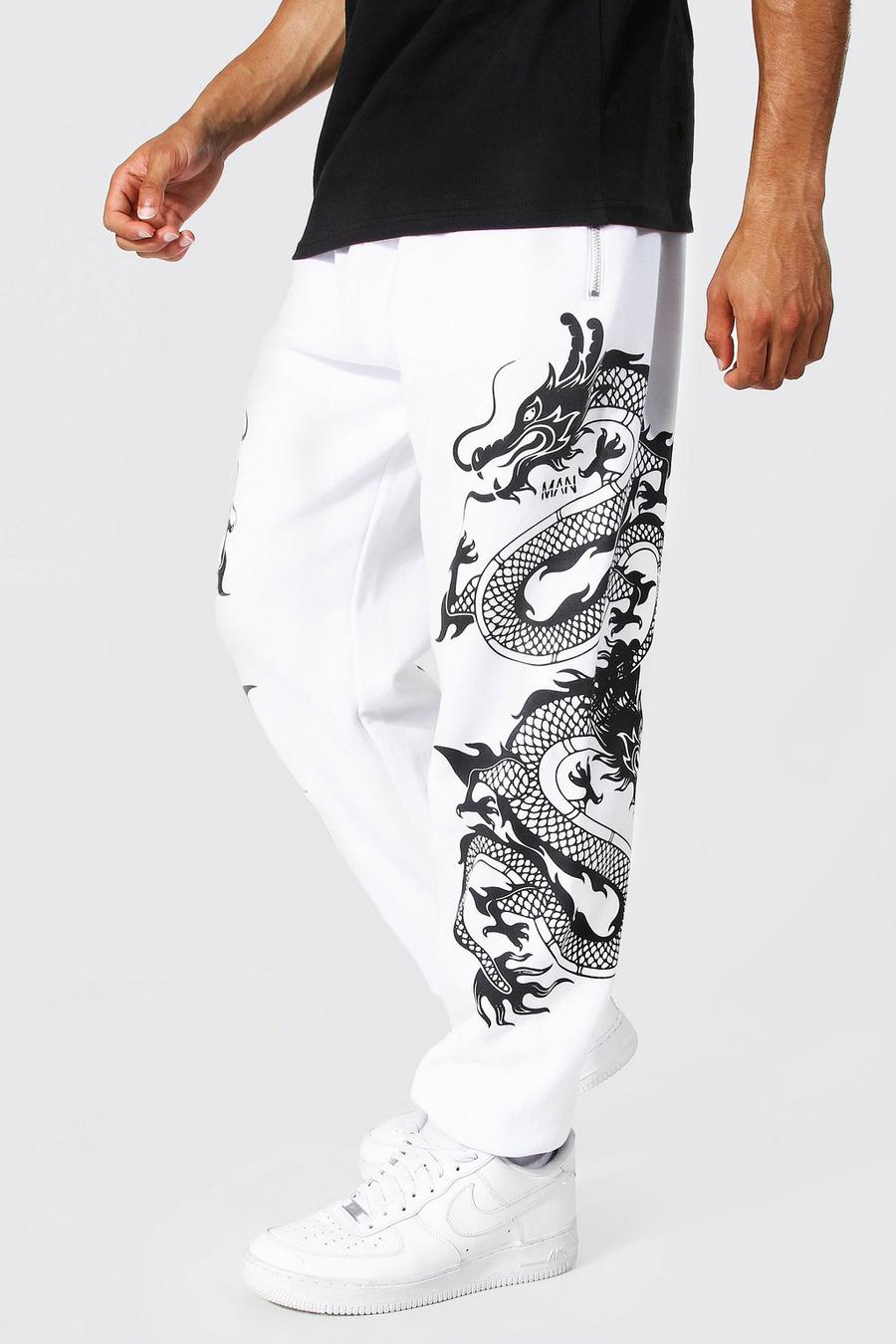 Pantaloni tuta Regular Fit con grafica di drago sulla gamba, White image number 1