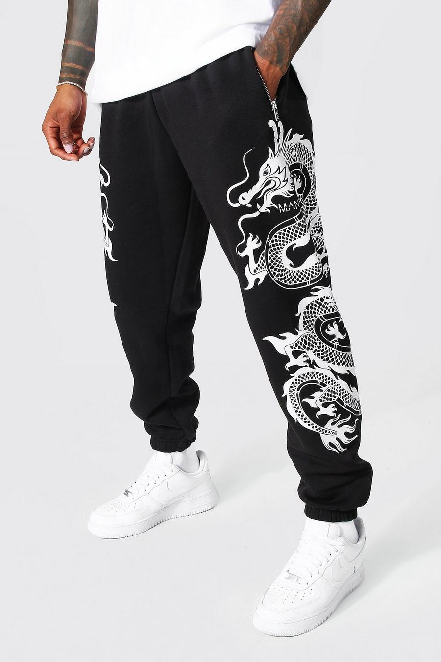 Pantalón deportivo Regular con estampado gráfico de dragón en la pierna, Black negro image number 1