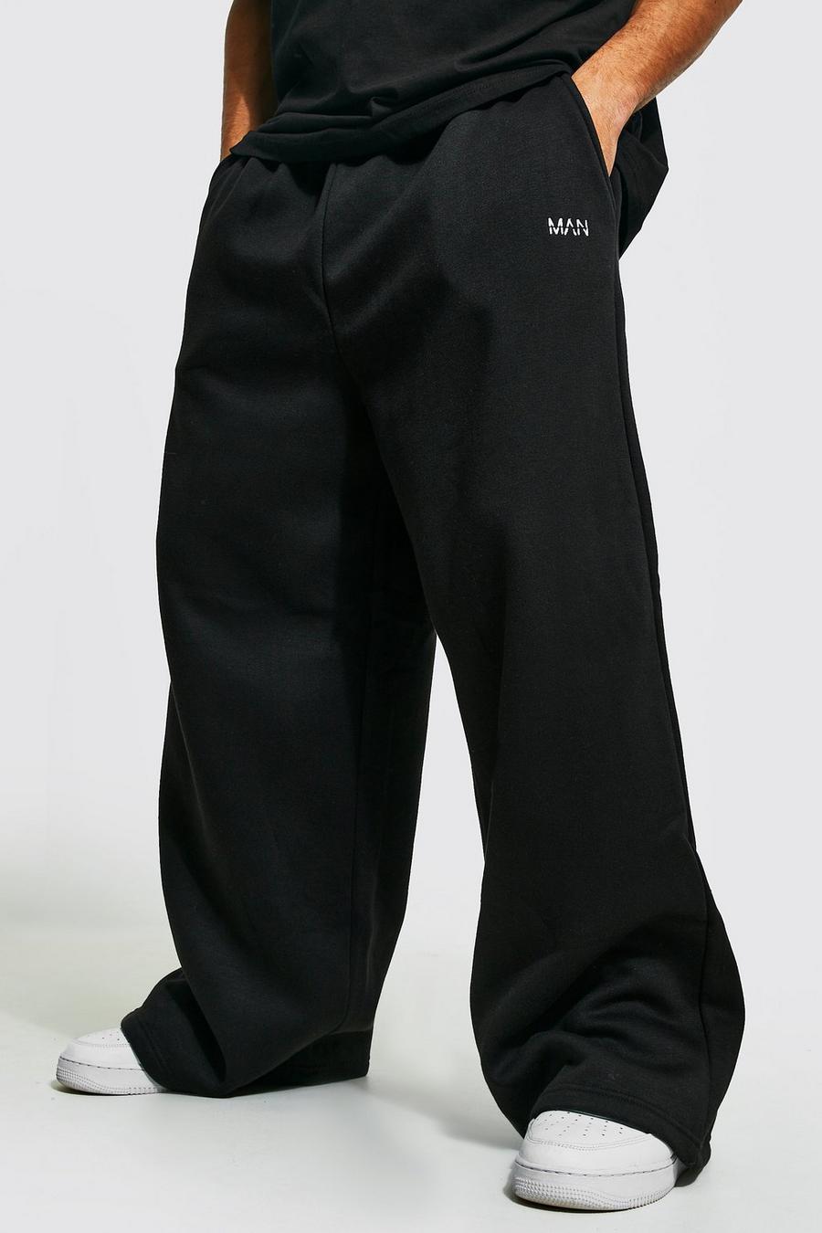 Pantalón deportivo MAN de pernera ancha extrema con bordado, Black nero image number 1