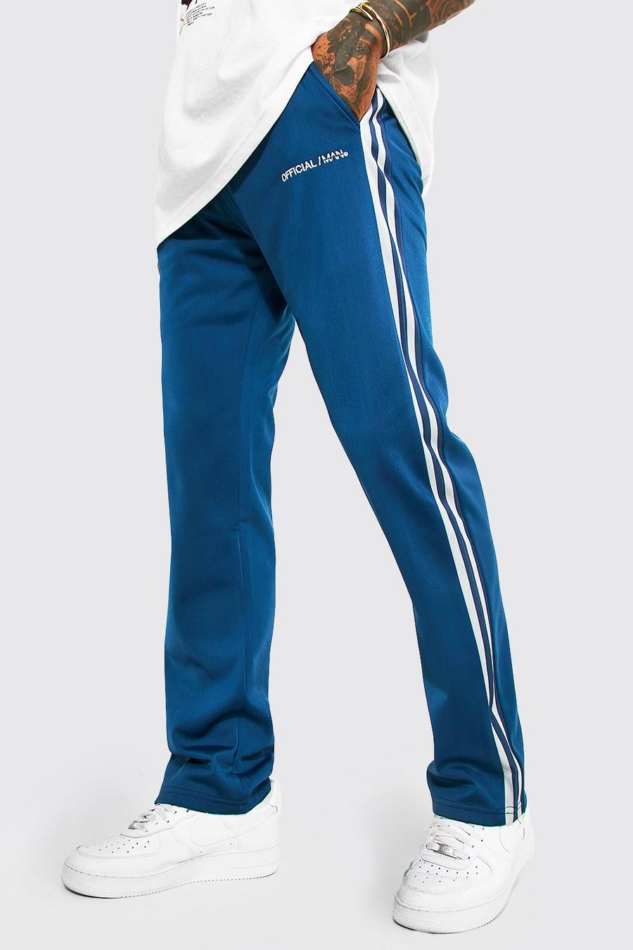 Pantalón deportivo holgado de tejido por urdimbre con franja lateral, Navy azul marino image number 1