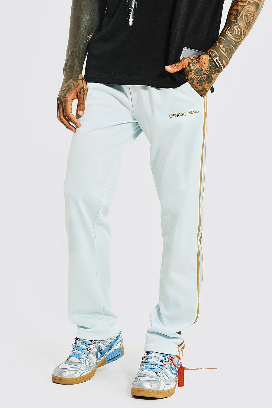 Pantalón deportivo holgado de tejido por urdimbre con franja lateral, Light blue image number 1