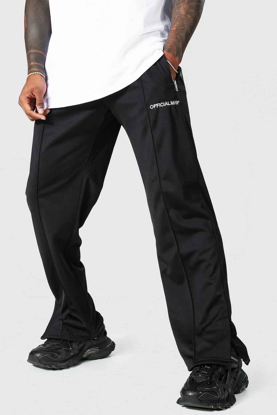 Pantalón deportivo holgado de tejido por urdimbre con abertura en el bajo, Black image number 1
