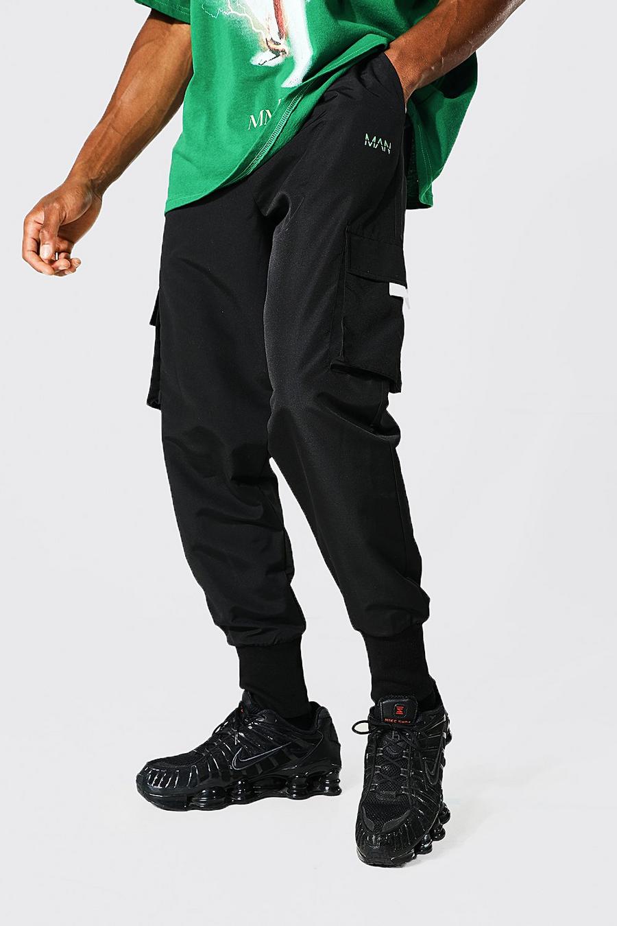 Black svart Man Deep Cuff Cargo Trousers image number 1