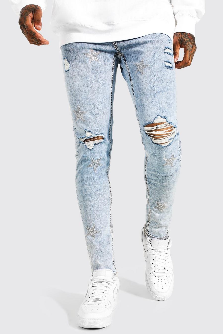 Ice blue Skinny jeans med slitna knän och strass image number 1