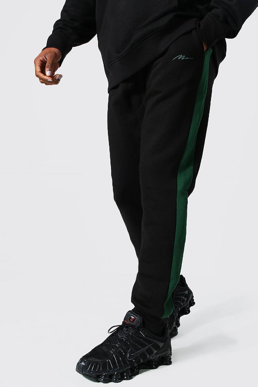 Black svart Original MAN Joggers i slim fit med blockfärger image number 1
