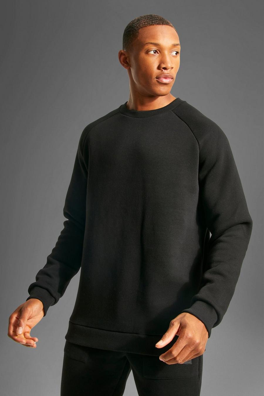Black svart MAN Active Sweatshirt med raglanärm image number 1