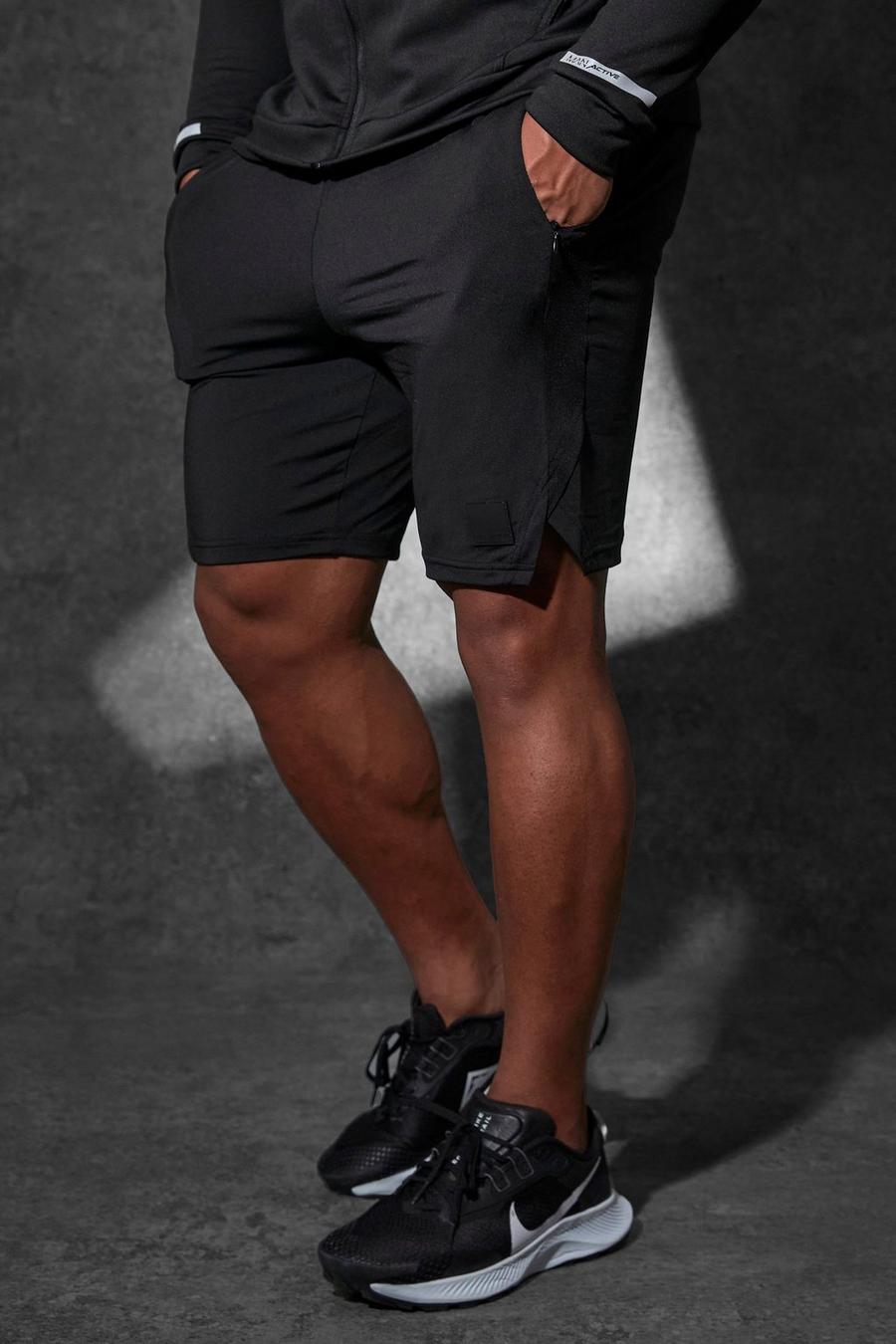 Pantaloncini Man Active per alta performance con spacco sul fondo, Black image number 1