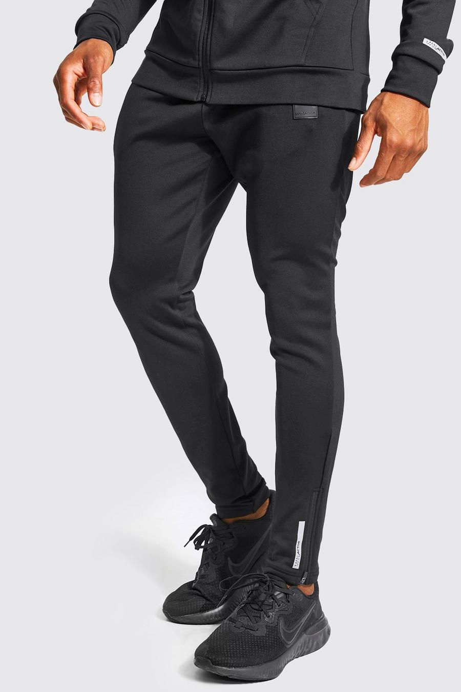 שחור מכנסי ריצה ספורטיביים לאימונים עם כיתוב Man image number 1