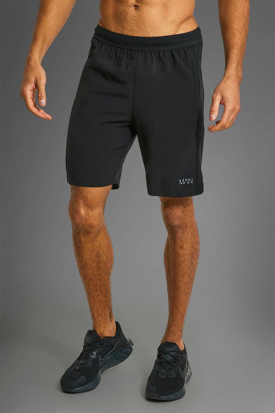 Pantalón corto MAN Active deportivo con cremallera en los bolsillos, Black image number 1