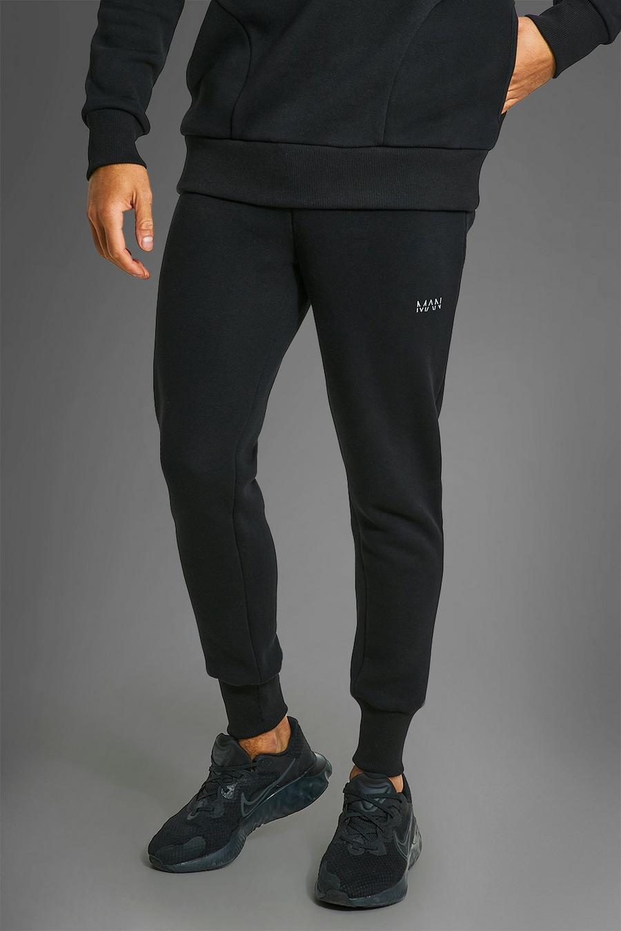Man Active Gym gerippte Jogginghose mit Reißverschluss-Taschen, Black image number 1