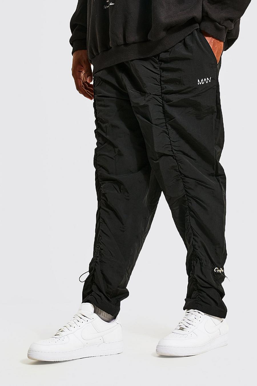 Pantalón Plus MAN con pernera recta fruncido de tela shell, Black negro image number 1