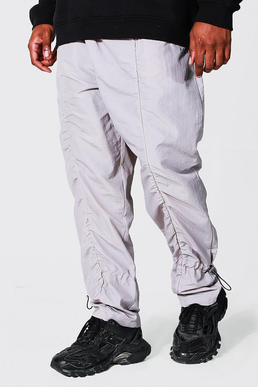 אפור מכנסיים בגזרה ישרה מבד עמיד עם כיווצים וכיתוב Man, למידות גדולות image number 1