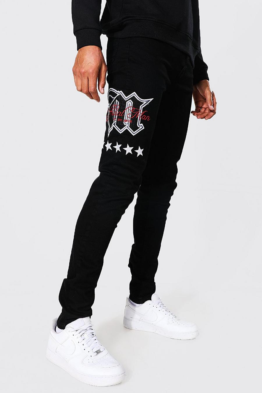 שחור סקיני ג'ינס עם אפליקציה בסגנון נבחרת ספורט, לגברים גבוהים image number 1