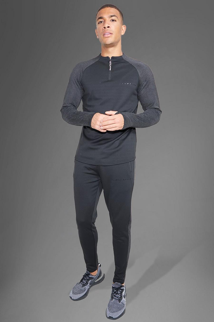 Man Active Gym Performance Trainingsanzug mit Trichterkragen, Black noir image number 1