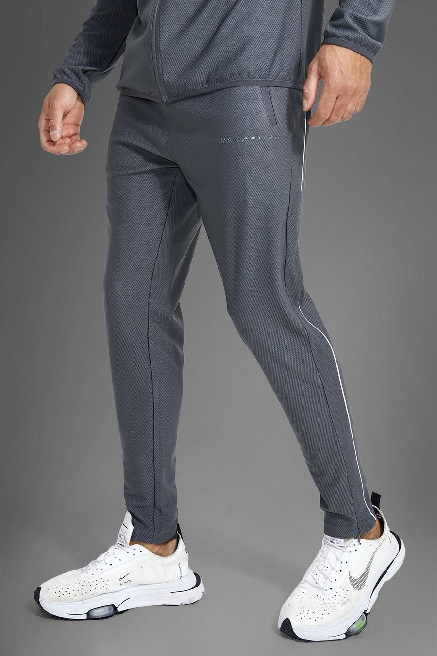 Man Active Gym Jogginghose mit reflekrierenden Pasplen, Grey gris image number 1