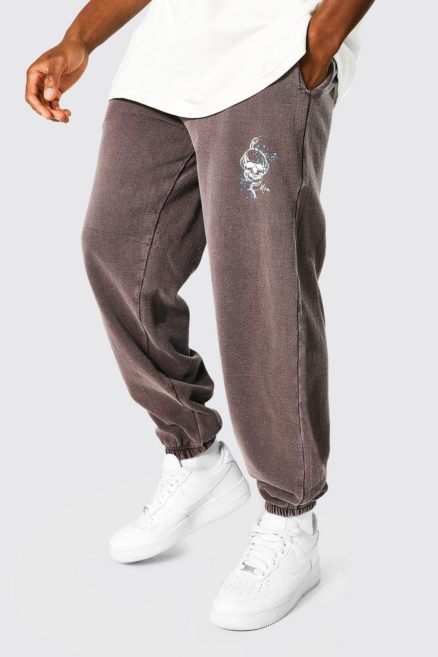 Brown Regular Fit Overdyed Skull Print Joggers image number 1