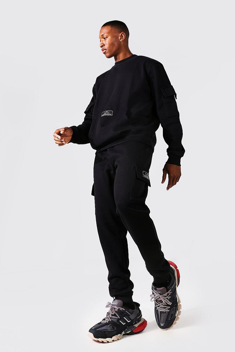 Black MAN Träningsoverall med sweatshirt och cargofickor image number 1