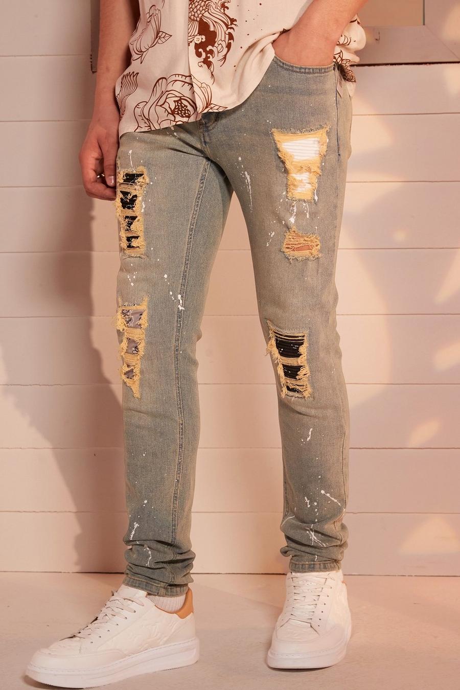 Blue Skinny jeans med slitage och lagningar image number 1