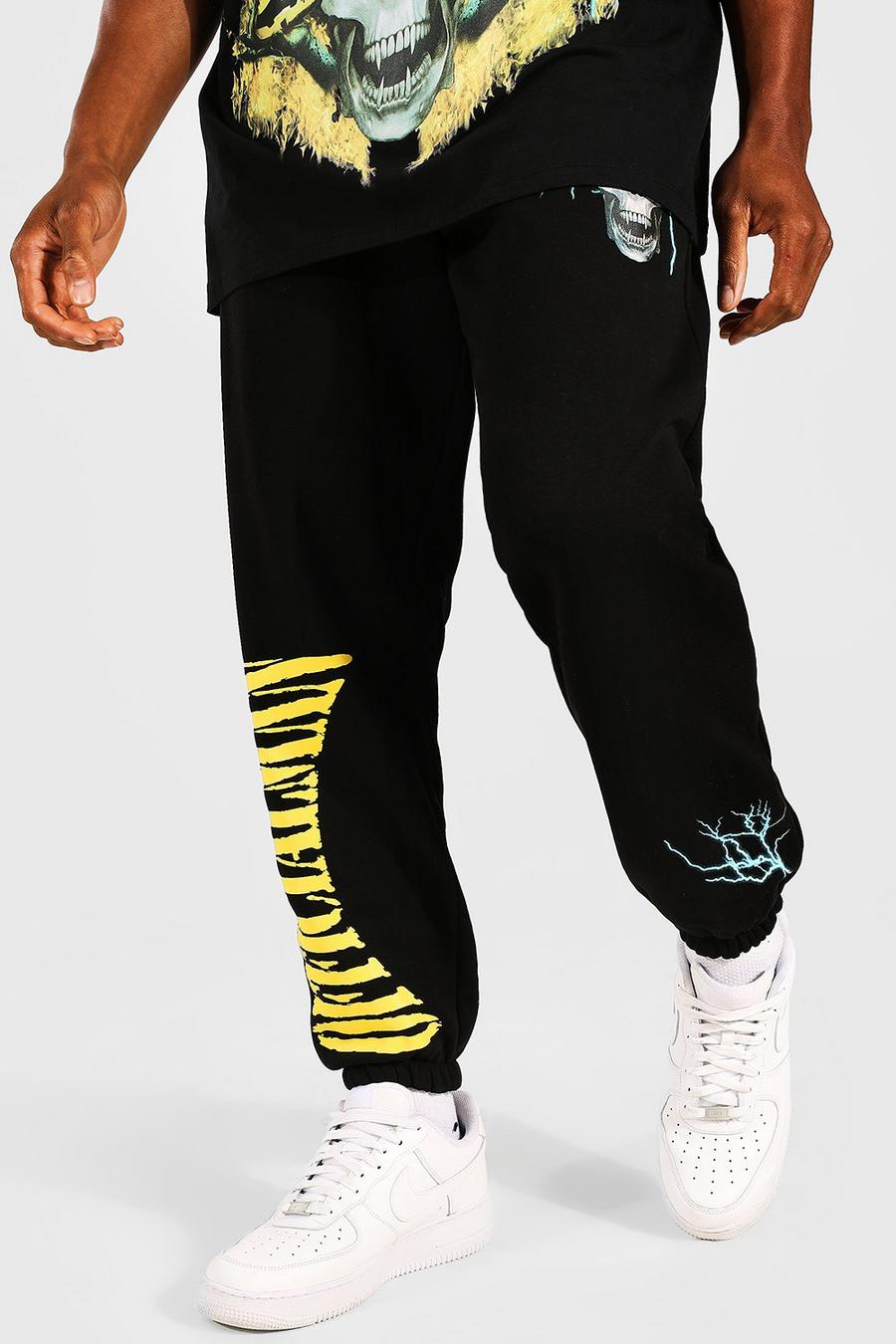 שחור מכנסי ריצה בגזרה רגילה עם הדפס גולגולת וכיתוב Official Man image number 1