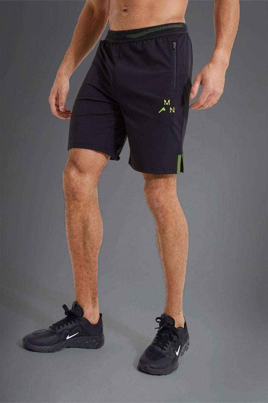 Pantalón corto MAN Active deportivo con detalle color fosforito, Black image number 1
