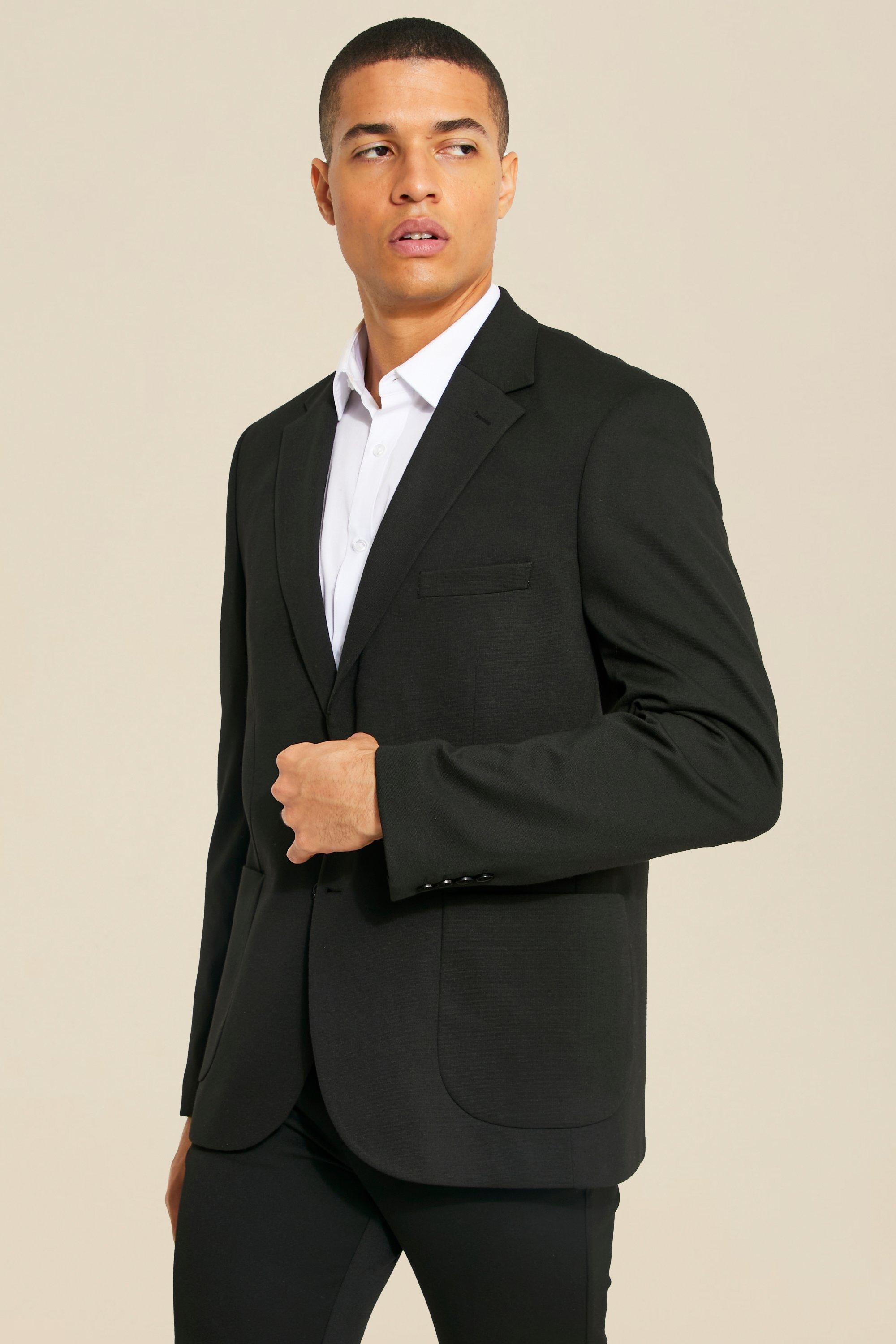 black blazer with gray pants